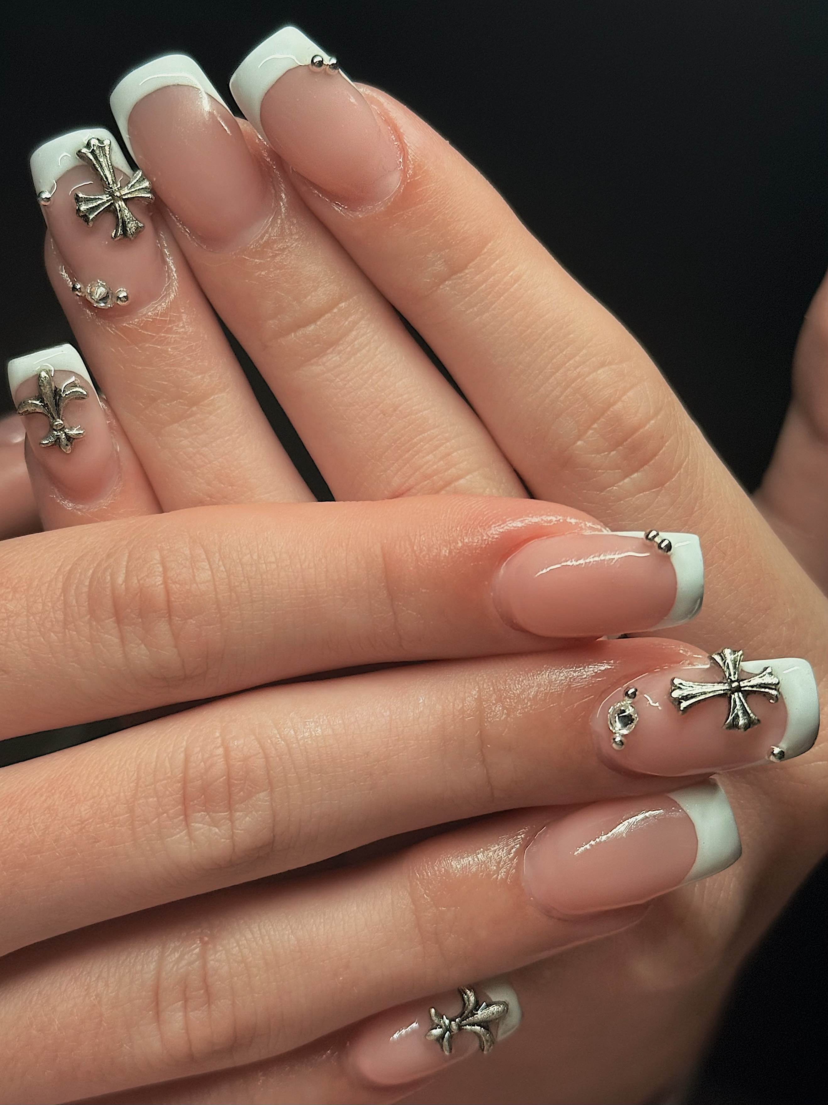 French tips with silver crosses and fleur-de-lis